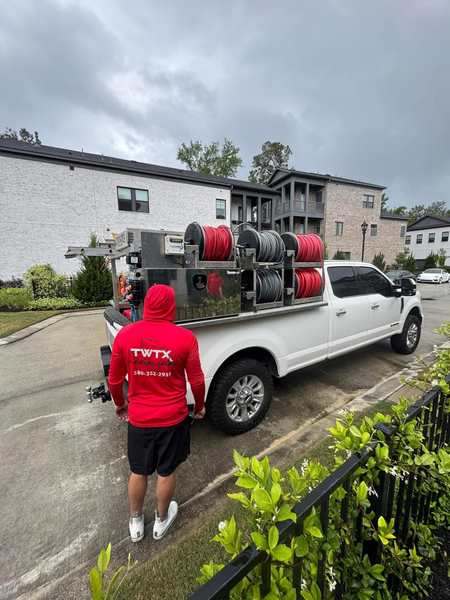 Amazing Power Wash residential service truck staged at a home before soft washing
